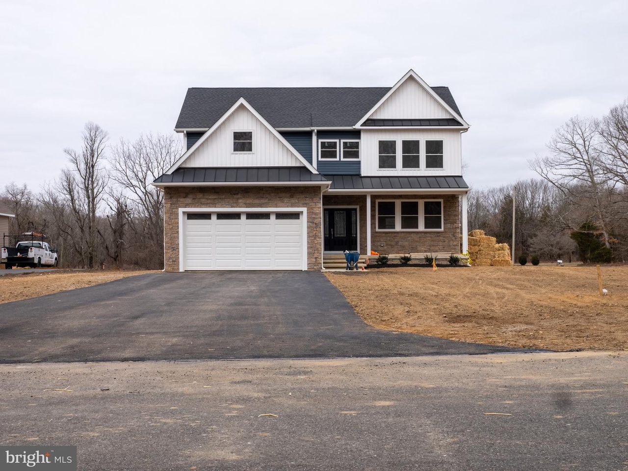 Exterior project photo for the clustered residential work at 2, 4, and 10 Kings Ct in Newfield.