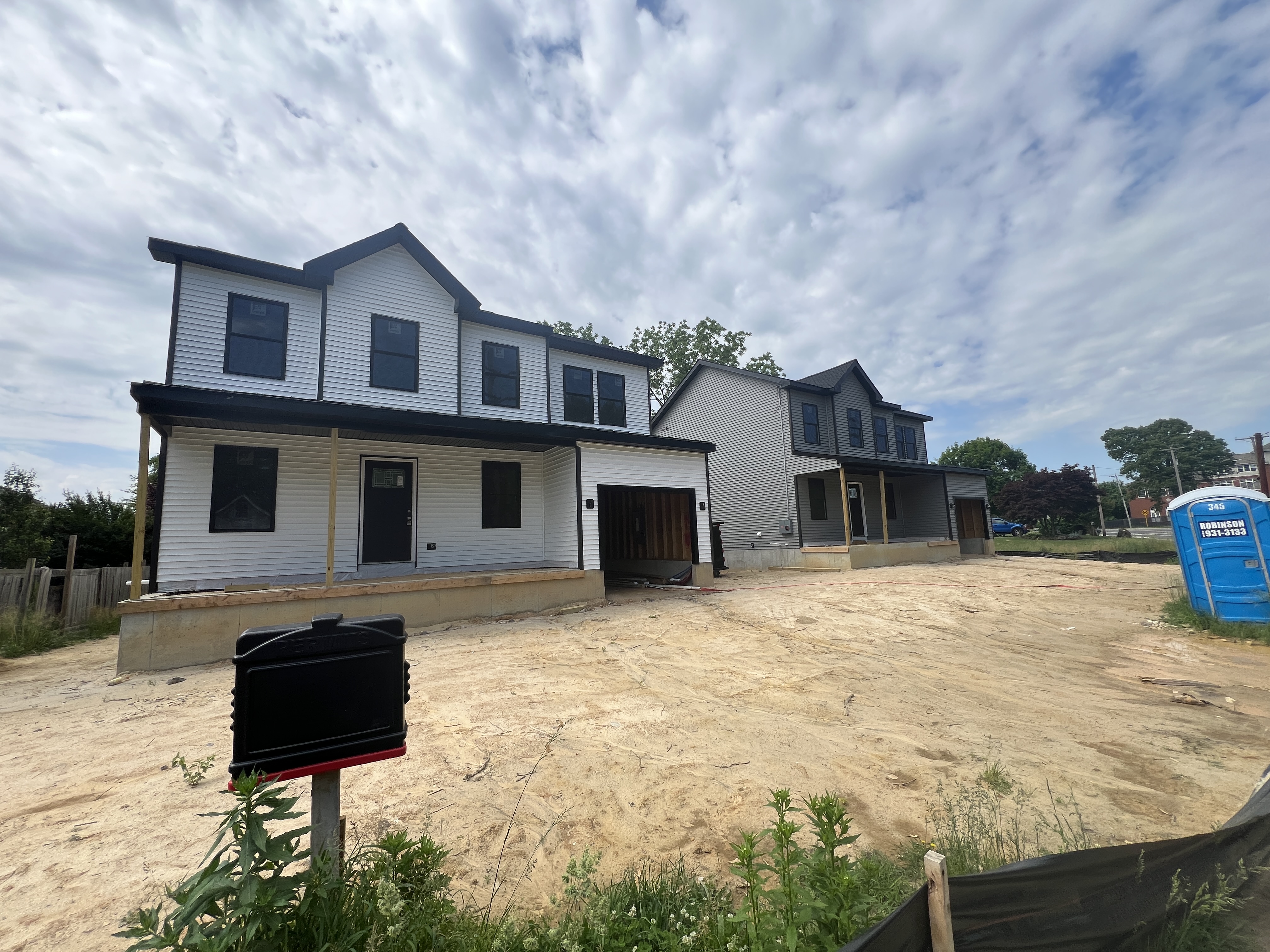Exterior project photo for the clustered residential work at 258 and 260 W Academy St in Clayton.