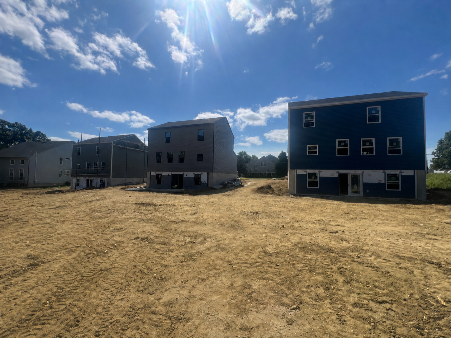 Exterior project photo for the clustered residential work at 309, 313, and 317 Ashland Ave in Lawnside.