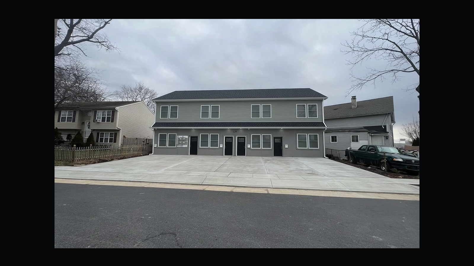 Completed 427 Salem Ave fourplex conversion exterior, reused from the homepage feature.
